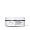 Jar of USRX Clean Skin Cleansing Bar treatment for clarifying skin on white background