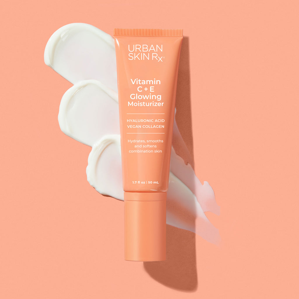 Bottle of Urban Skin RX Vitamin C + E Bright Glowing Moisturizer with a swatch of product on a pale pink background 
