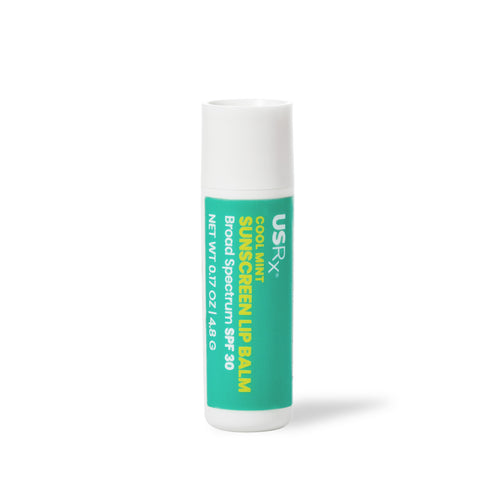 A single stick of USRX Cool Mint Sunscreen Lip Balm Broad Spectrum SPF30