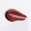 Swatch of deep copper, glossy USRx Tinted Hydrating Lip Treatment in Toasty on a white background