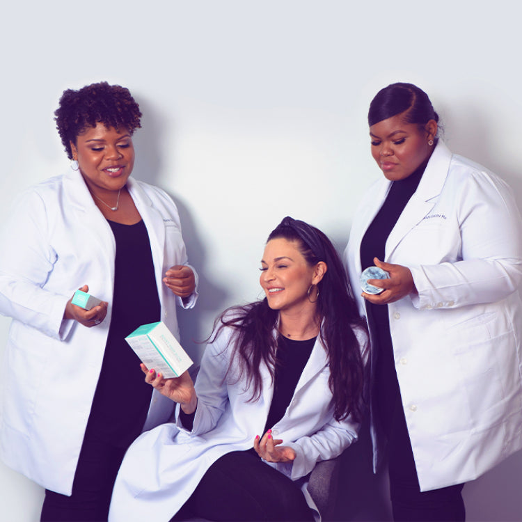 three women in labcoats